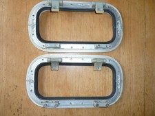 2 lewmar portlights size 0, silver with smoked perspex in good condition.