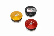 Rear wheel nut plug - left