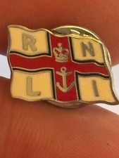 Small silver metal RNLI flag badge