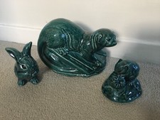 POOLE BLUE GLAZED OTTER , RABBIT PREENING AND VOLE STRAWBERRY  FIGURE B L  ADAMS