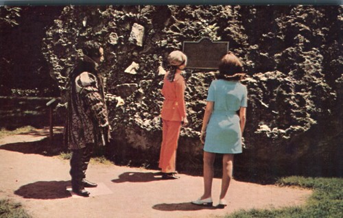Tourists admiring tufa rock - tourists,