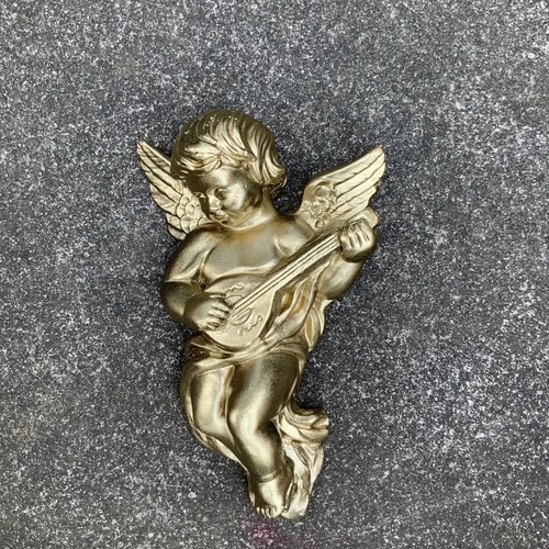 Plaster wall hanging cherub - wall,