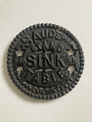 Vintage cast iron trivet - vintage,