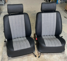 A pair of Used Porsche 911 LWB seats 1969-71 retrimmed black vinyl/houndstooth