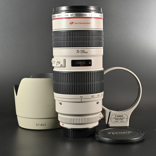 Near mint canon 200mm - mint,