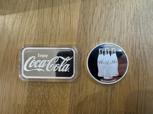 Silver coke coin - oz,