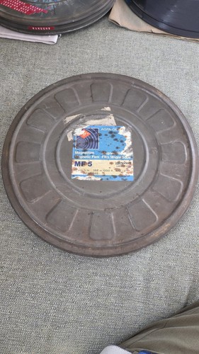 16mm film can - film, in