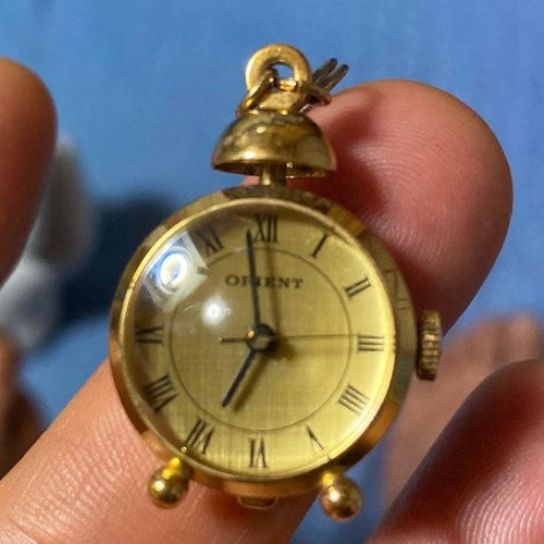 Orient watch pendant - watch,