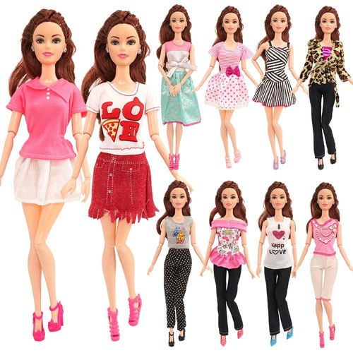 Ten barbie doll dresses - doll,