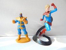 Two mini figures of Thanos and Carol Danvers from Marvel in one lot.