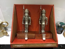 Christmas Nutcracker Pair Of Silver Metal And Wood Stocking Hangers Holders