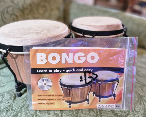 Bongos with music book - bongos,