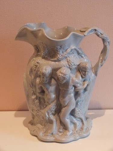Relief moulded grey stoneware - moulded,