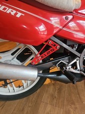 CUSTOM HONDA NS125 R EXHAUST HANGER BRACKET