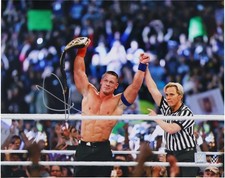 John Cena WWE Signed 16" x 20" Raising Title Photo