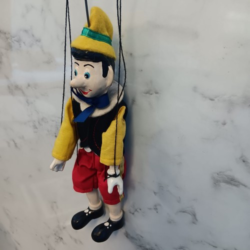 Pinocchio marionette string - pinocchio,