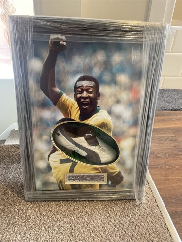 Pele signed boot - signed, framed