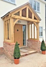 "THE BROADWAY" PORCH in solid oak. UNDER CURVED FRONT BEAM & FULL CURVED BRACES