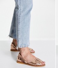 Leather woven flat sandals in