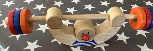 Wooden circus strong man - strong,