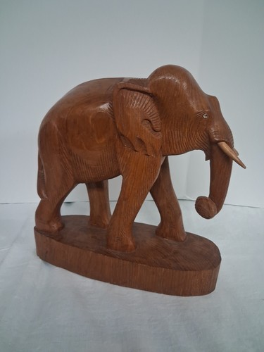Hand carved wooden elephant - hand,