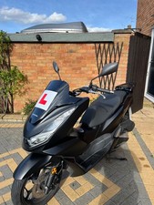 black honda pcx 125