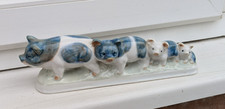 4 Little Pigs in a Row, Porcelain Ornament by John Jenkins