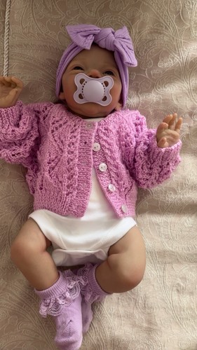 Weighted reborn baby doll - ,