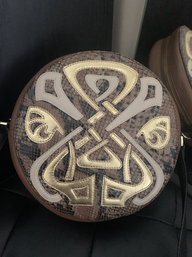 Gorgeous rare round - round, leather