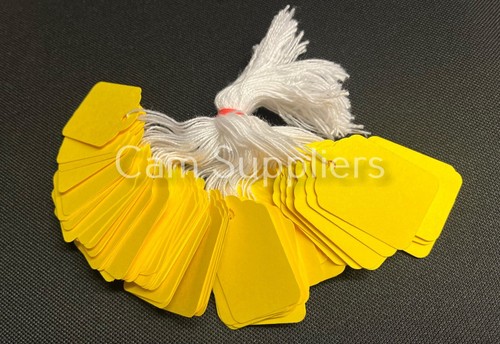 Yellow strung tickets - yellow,