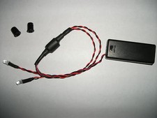 BATTERY POWERED DUAL FLASHING RED LED