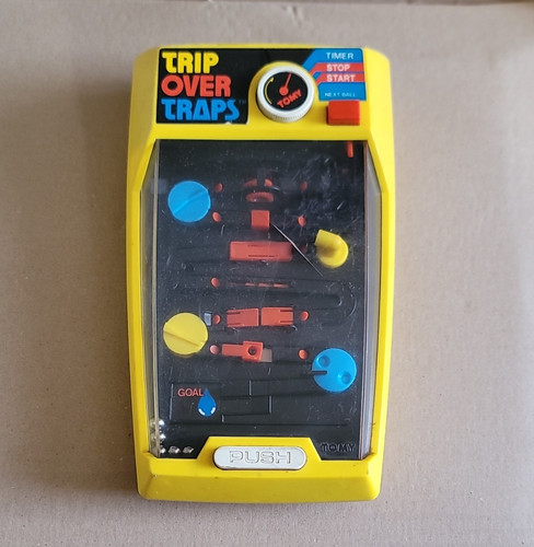 Tomy trip over traps yellow - trip,