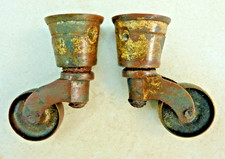 A  Pair of  antique castors in brass ideal small table etc