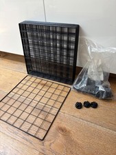 Modular black metal play pen for small animals. Used but good condition. 