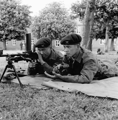Gurkha soldier checks - , his