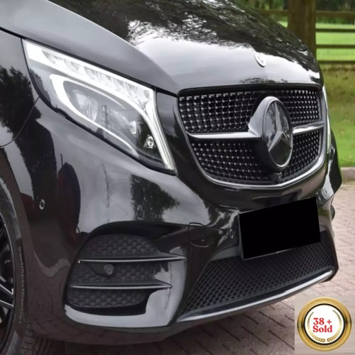 Front grille emblem - front,