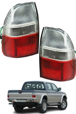 COPPIA FARI FANALI POSTERIORI DESTRO SINISTRO per MITSUBISHI L200 dal 1999