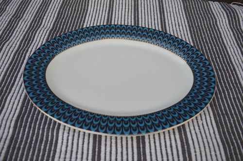 Pied terre peacock serving - 'peacock',