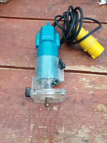 Makita 3703 4in router - 1/4in,