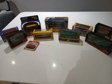 10 Die-Cast Buses/Trams -