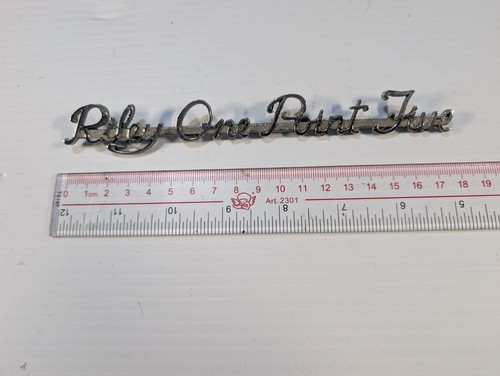 Riley one point five - , badge