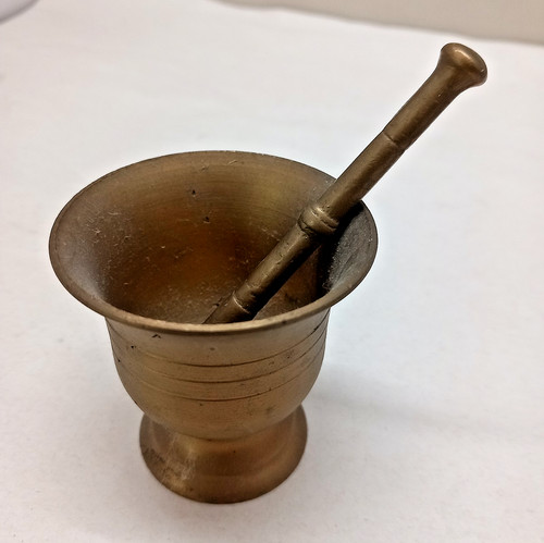 Vintage small brass pestle and - pestle,
