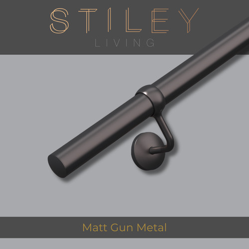 Gun metal handrail indoor - gun, wall