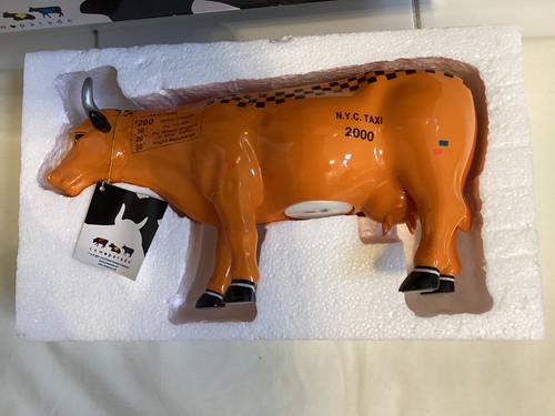 Cow parade rare taxi - taxi,