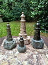 A COLLECTION OF FOUR CORNISH SERPENTINE LIGHTHOUSES