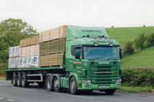 COL PHOTO: STAMPERS (CUMBRIA) SCANIA 124 ARTIC FLAT TRAILER - W761 PHH
