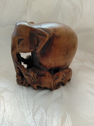 Hand carved wooden - hand, elephant