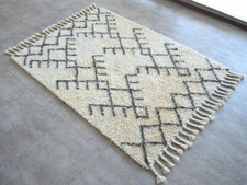  Zara Woolen Rug , White colour , Rarely used
