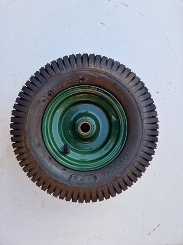 Two ride mower front wheels - front,