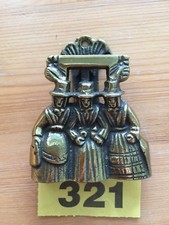 Antique door knocker.Three ladies, brass. item 321